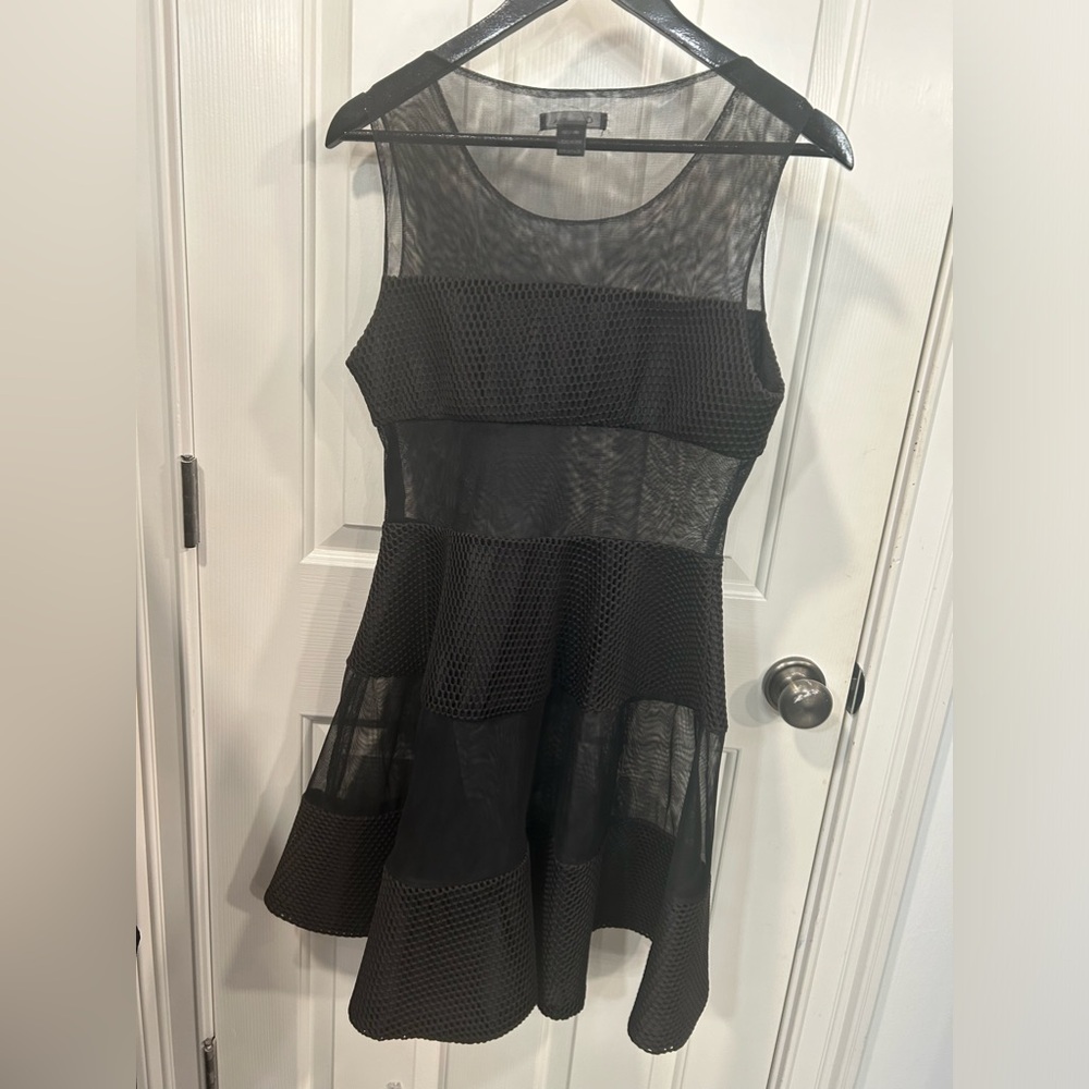 Black Gracia Mesh Panel Dress in a size Large Good Used Condition